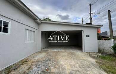 Imagem: A casa possui 2 Dormitórios, 1 Banheiro, 2 Vagas na garagem