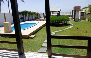 Imagem: A casa possui 3 Dormitórios, 2 Banheiros, 3 Vagas na garagem