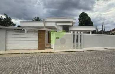 Imagem: A casa possui 3 Dormitórios, 2 Banheiros, 2 Vagas na garagem