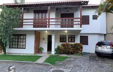 Imagem: A casa em condomínio possui 3 Dormitórios, 4 Banheiros, 2