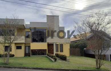Imagem: A casa em condomínio possui 4 Dormitórios, 5 Banheiros, 5