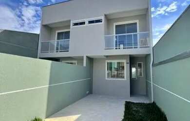 Imagem: A casa possui 3 Dormitórios, 3 Banheiros, 2 Vagas na garagem