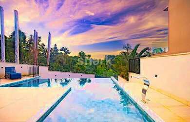 Imagem: A casa em condomínio possui 4 Dormitórios, 5 Banheiros, 4