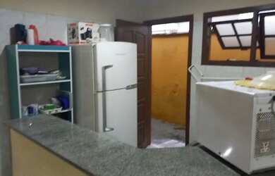 Imagem: A casa possui 2 Dormitórios, 2 Vagas na garagem e está localizado