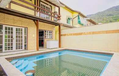 Imagem: A casa em condomínio possui 4 Dormitórios, 4 Banheiros, 3