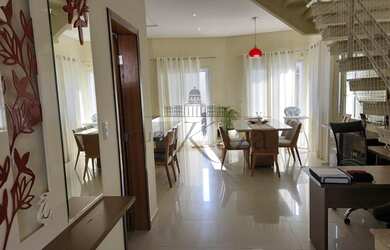 Imagem: A casa possui 3 Dormitórios, 3 Banheiros, 3 Vagas na garagem