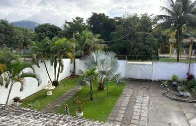 Imagem: A casa possui 5 Dormitórios, 5 Banheiros, 2 Vagas na garagem