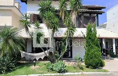 Imagem: A casa em condomínio possui 5 Dormitórios, 3 Banheiros, 2