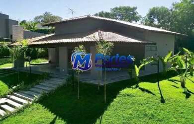 Imagem: A casa em condomínio possui 4 Dormitórios, 5 Banheiros, 4