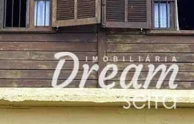 Imagem: A casa possui 5 Dormitórios, 3 Banheiros, 2 Vagas na garagem