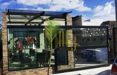 Imagem: A casa possui 2 Dormitórios, 3 Banheiros, 2 Vagas na garagem