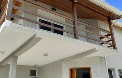 Imagem: A casa possui 5 Dormitórios, 4 Banheiros, 5 Vagas na garagem