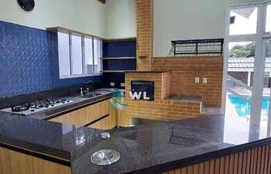 Imagem: A casa em condomínio possui 4 Dormitórios, 5 Banheiros, 4