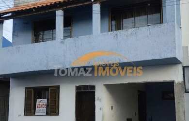 Imagem: A casa possui 5 Dormitórios, 2 Banheiros, 1 Vaga na garagem