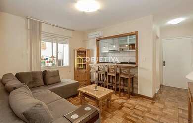 Imagem: O apartamento possui 1 Dormitório, 1 Banheiro, 1 Vaga na garagem