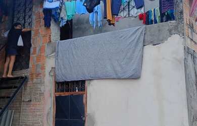 Imagem: A casa possui 3 Dormitórios, 2 Banheiros e está localizado