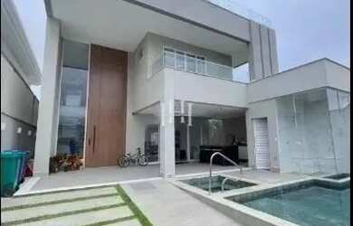 Imagem: A casa em condomínio possui 5 Dormitórios, 5 Banheiros, 2