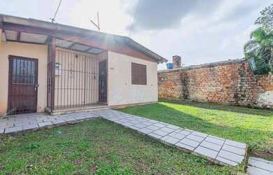 Imagem: A casa possui 3 Dormitórios, 1 Banheiro e 120m² de Área e