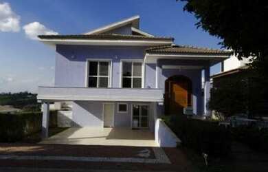 Imagem: A casa possui 4 Dormitórios, 5 Banheiros, 5 Vagas na garagem