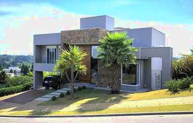 Imagem: A casa em condomínio possui 5 Dormitórios, 5 Banheiros, 4