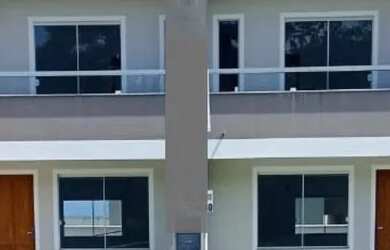 Imagem: A casa possui 2 Dormitórios, 1 Banheiro, 2 Vagas na garagem