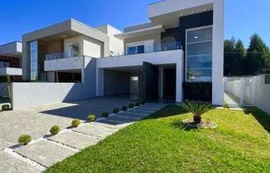 Imagem: A casa em condomínio possui 3 Dormitórios, 2 Banheiros, 4