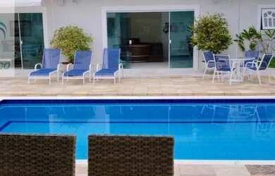 Imagem: A casa em condomínio possui 5 Dormitórios, 5 Banheiros, 4