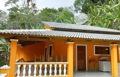 Imagem: A casa possui 4 Dormitórios, 4 Vagas na garagem e está localizado