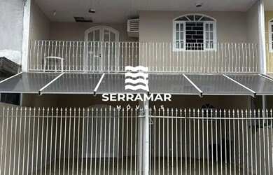 Imagem: A casa possui 5 Dormitórios, 3 Banheiros, 2 Vagas na garagem