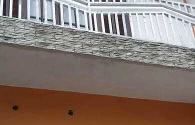 Imagem: A casa possui 3 Dormitórios, 4 Banheiros, 5 Vagas na garagem