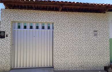 Imagem: A casa possui 3 Dormitórios, Acomodam 15 pessoas, 1 Vaga na