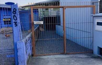 Imagem: A casa possui 2 Dormitórios, 1 Banheiro, 1 Vaga na garagem