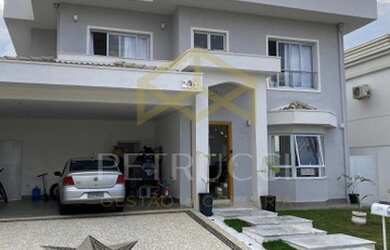 Imagem: A casa em condomínio possui 4 Dormitórios, 5 Banheiros, 4