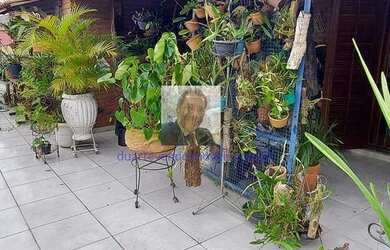 Imagem: A casa possui 3 Dormitórios, 5 Banheiros, 2 Vagas na garagem