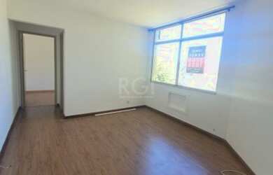 Imagem: O apartamento possui 1 Dormitório, 1 Banheiro, 1 Vaga na garagem