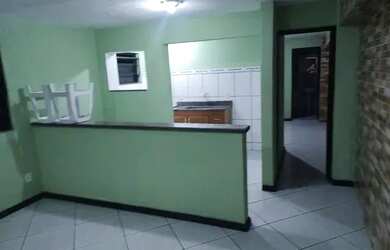 Imagem: A casa possui 2 Dormitórios, 1 Banheiro e 2 Vagas na garagem