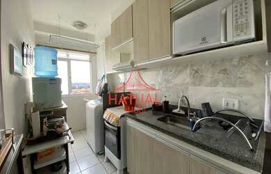 Imagem: O apartamento possui 2 Dormitórios, 1 Banheiro, 1 Vaga na garagem