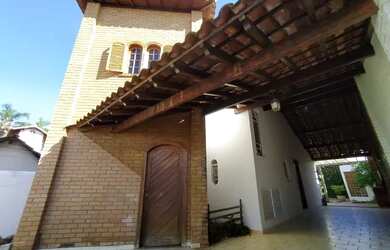 Imagem: A casa possui 3 Dormitórios, 3 Banheiros, 3 Vagas na garagem