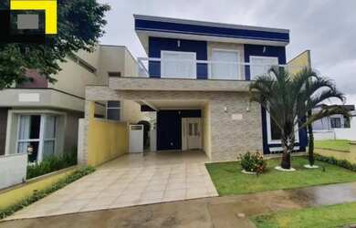 Imagem: A casa possui 3 Dormitórios, 5 Banheiros, 4 Vagas na garagem