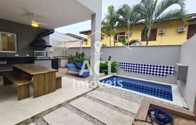 Imagem: A casa possui 3 Dormitórios, 4 Banheiros, 2 Vagas na garagem