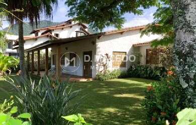 Imagem: A casa possui 5 Dormitórios, 5 Banheiros, 2 Vagas na garagem