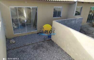 Imagem: A casa possui 2 Dormitórios, 1 Banheiro, 1 Vaga na garagem