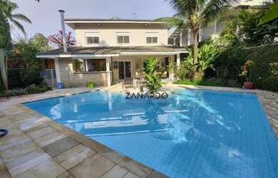 Imagem 1: Casa 5 dormitórios, 420 m² - venda por R$ 7.500.000 ou aluguel por R$ 7.000/mês - Riviera