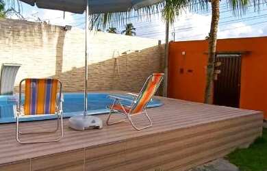 Imagem: A casa possui 3 Dormitórios, 4 Vagas na garagem e está localizado