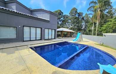 Imagem: A casa em condomínio possui 3 Dormitórios, 5 Banheiros, 5