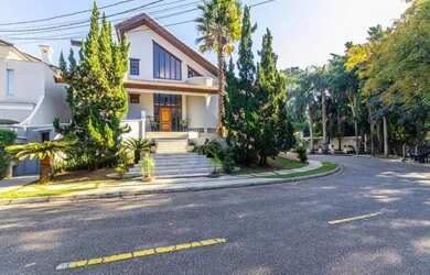 Imagem: A casa em condomínio possui 4 Dormitórios, 5 Banheiros, 5