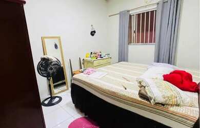 Imagem: A casa possui 2 Dormitórios, 2 Banheiros e está localizado