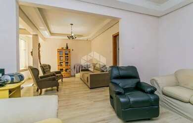 Imagem 2: Apartamento de 113m2, living em 3 ambientes cercado por jardim de inverno