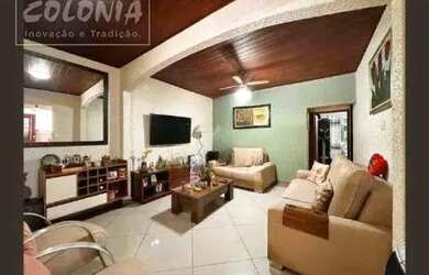 Imagem: A casa possui 2 Dormitórios, 3 Banheiros, 3 Vagas na garagem