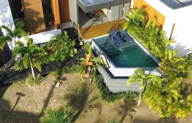 Imagem: A casa em condomínio possui 5 Dormitórios, 5 Banheiros, 4